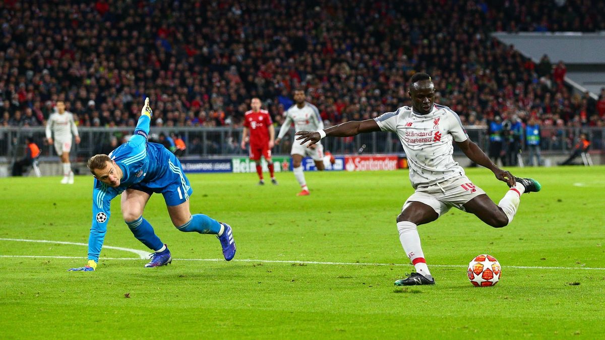 Sadio Mane of Liverpool scores the opening goal during the UEFA Champions League Round of 16 Second Leg match between FC Bayern Muenchen and Liverpool at Allianz Arena on March 13, 2019 in Munich, Bavaria.