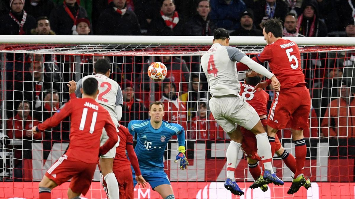 Champions League - Round of 16 Second Leg - Bayern Munich v Liverpool - Allianz Arena, Munich, Germany - March 13, 2019 Liverpool's Virgil van Dijk scores their second goal