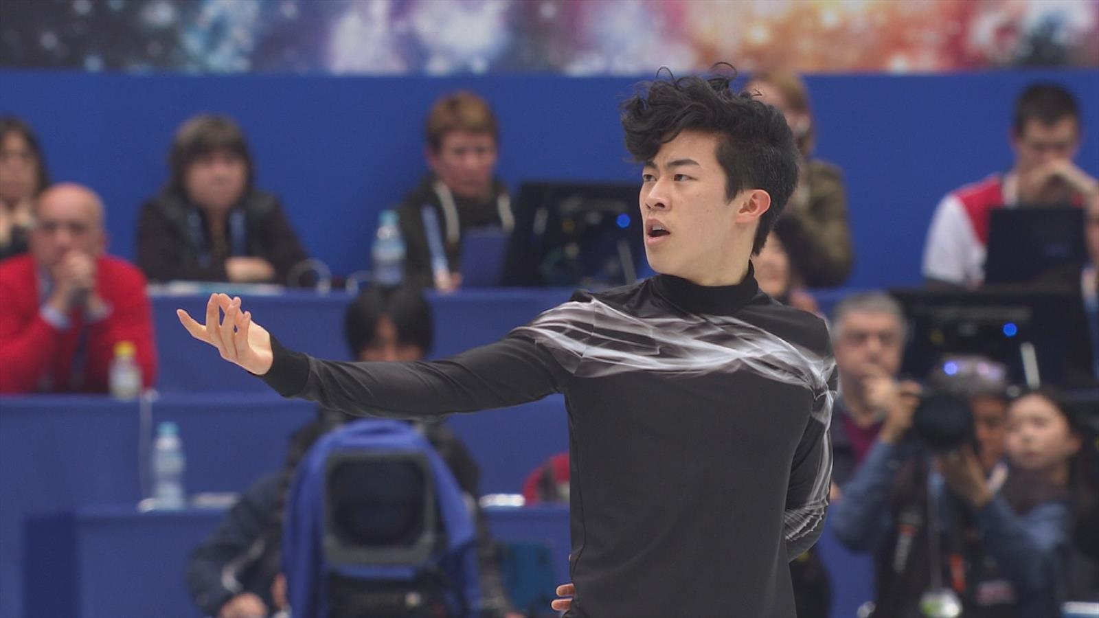 Figure skating video Nathan Chen sets world record to defend title in