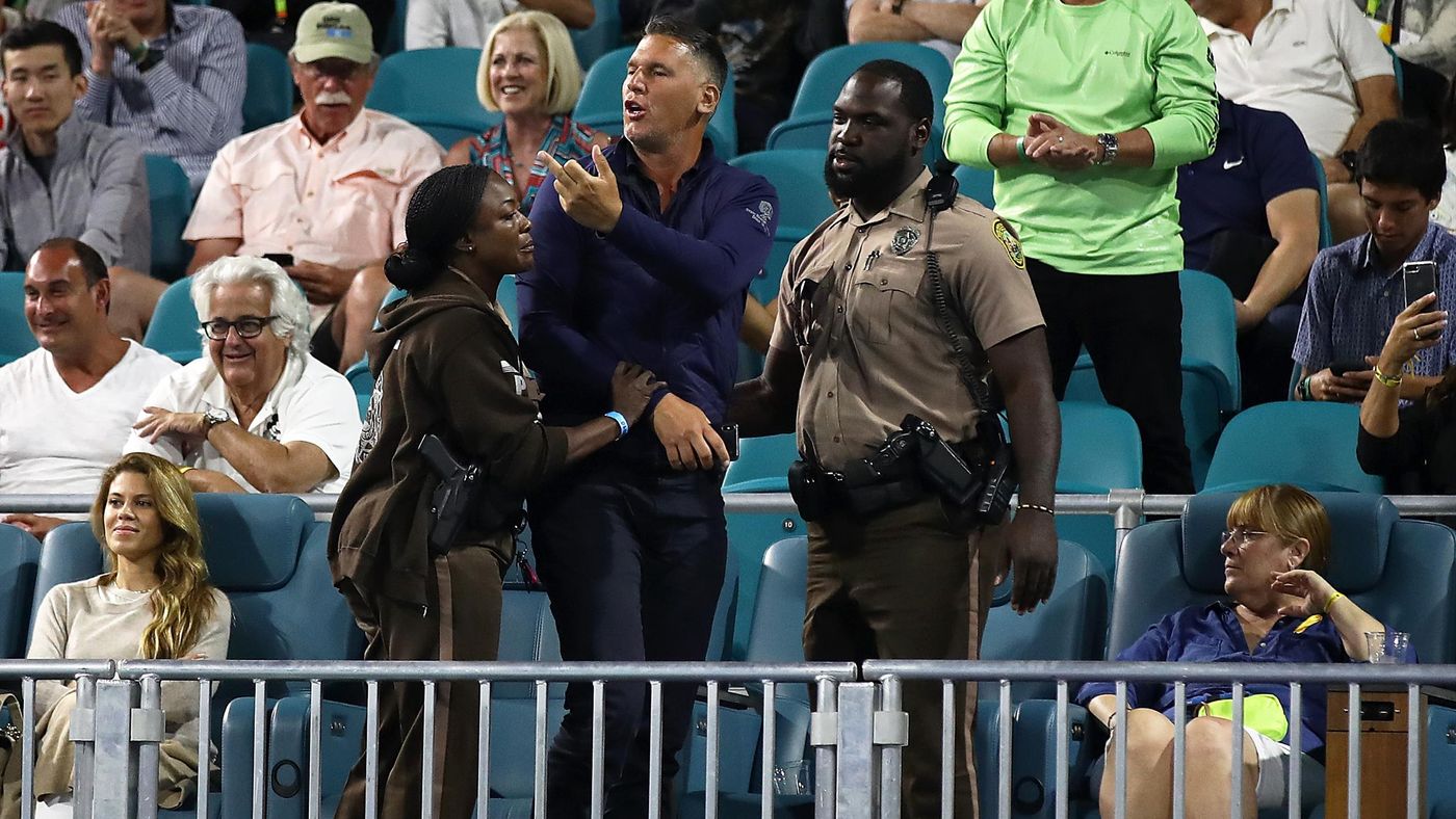 A fan was escorted away after verbals with Kyrgios