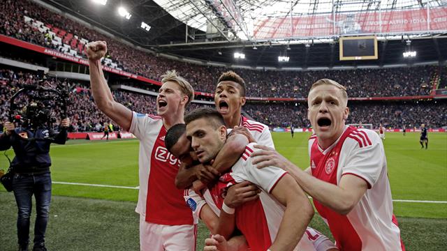Ten-man Ajax close gap on PSV to just two points