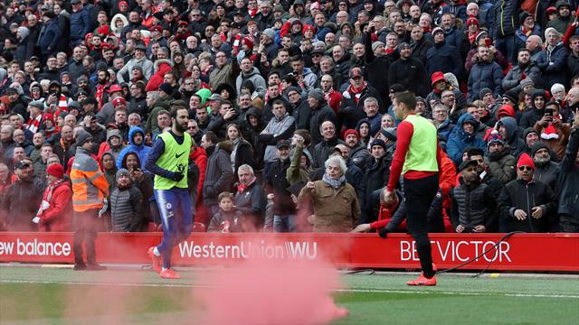 Liverpool vows to ban fan who threw flare into Chelsea end
