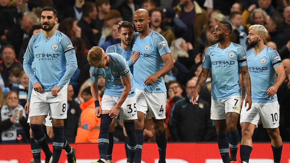 Vincent Kompany is congratulated by Bernardo Silva on his magnificent strike