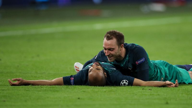 Lucas Moura of Tottenham Hotspur celebrates at full time with Christian Eriksen of Tottenham Hotspur during the UEFA Champions League Semi Final second leg match between Ajax and Tottenham Hotspur at the Johan Cruyff Arena on May 8, 2019 in Amsterdam, Net