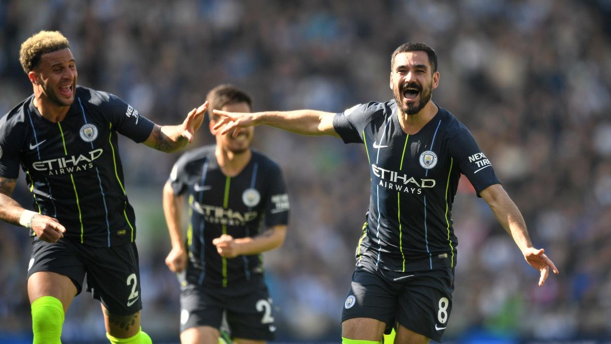 Ilkay Gundogan of Manchester City celebrates after scoring his team's fourth goal during the Premier League match between Brighton & Hove Albion and Manchester City