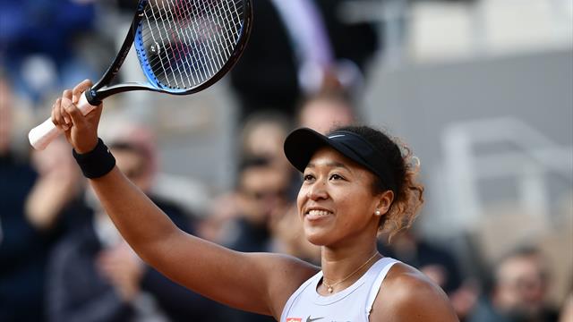 World number one Osaka completes remarkable comeback to progress