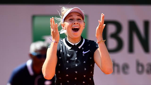 Teenager Anisimova stuns defending champ Halep to reach final four