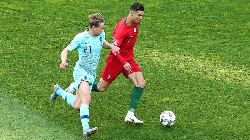 PORTO, PORTUGAL - JUNE 09: Cristiano Ronaldo of Portugal battles for possession with Frenkie de Jong of the Netherlands during the UEFA Nations League Final between Portugal and the Netherlands at Estadio do Dragao on June 09, 2019 in Porto, Portugal. (Ph