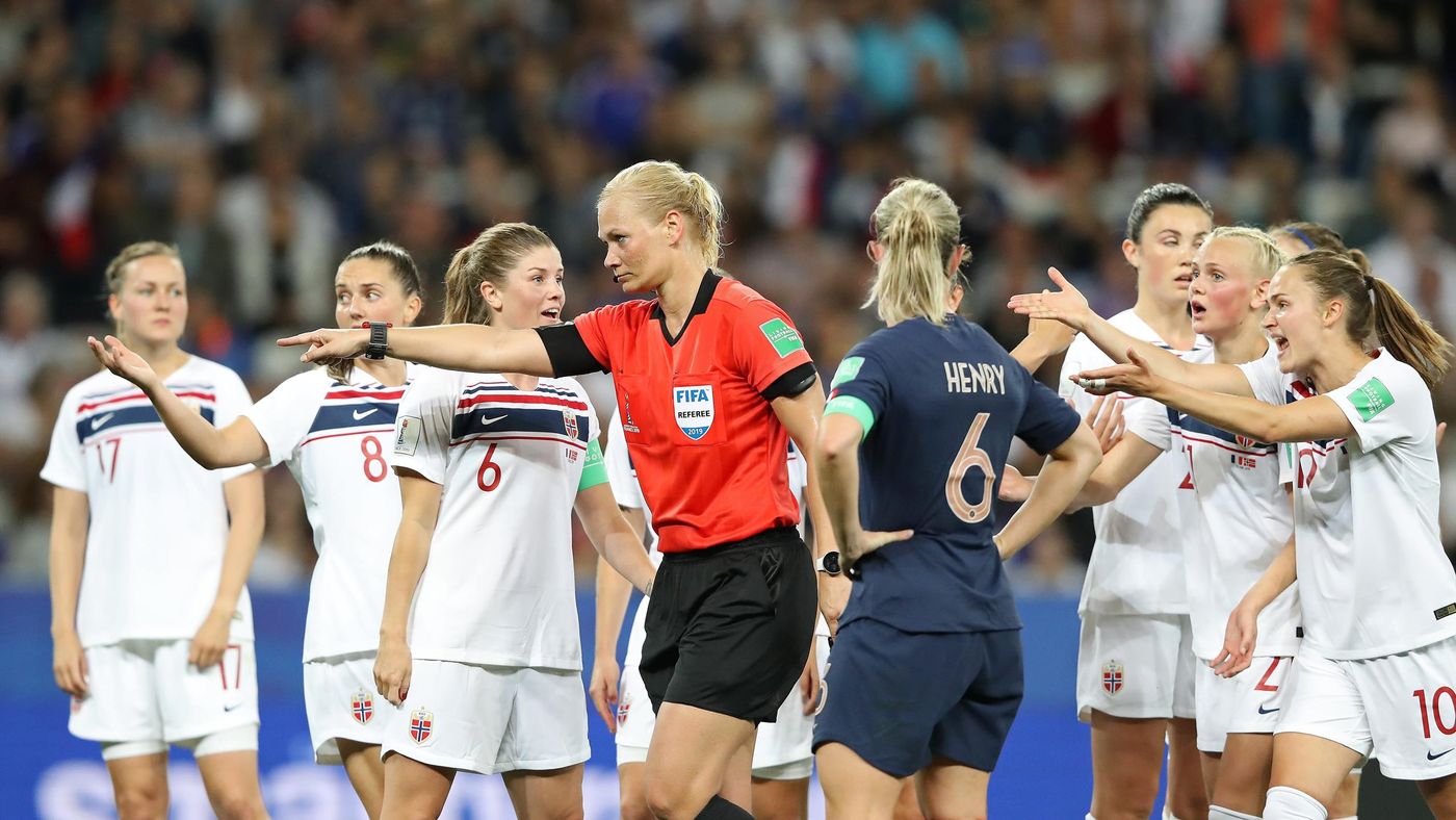 Norway players react as Referee Bibiana Steinhaus points to the penalty spot