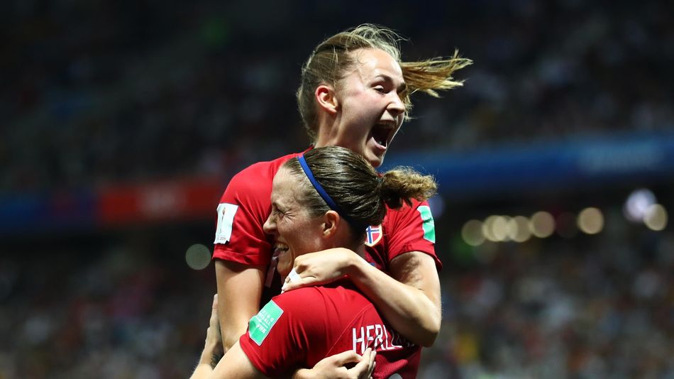 Isabell Herlovsen of Norway celebrates with teammate Caroline Graham Hansen after scoring her team's first goal during the 2019 FIFA Women's World Cup France Round Of 16 match between Norway and Australia at Stade de Nice on June 22, 2019 in Nice, France.