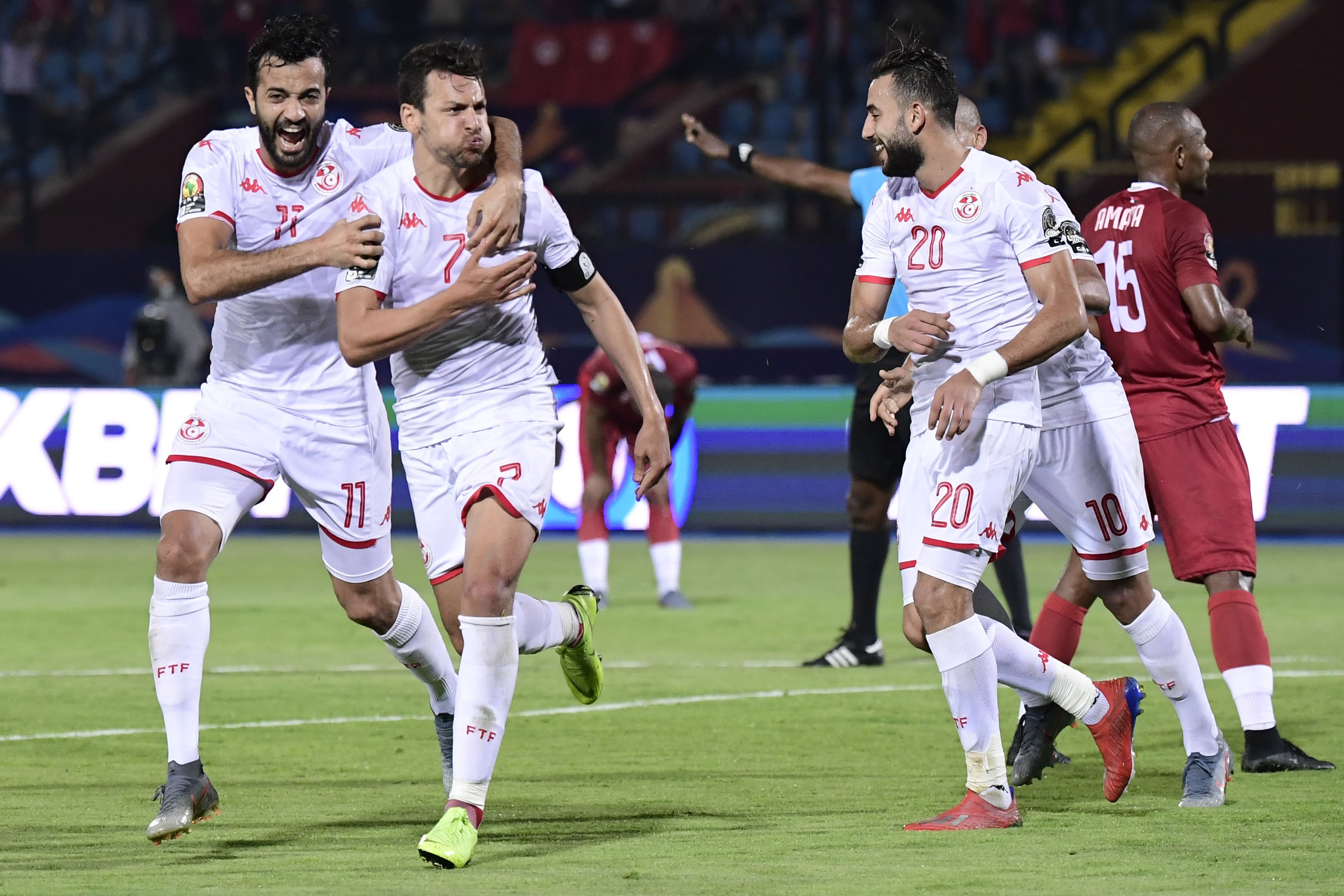 Tunisia's midfielder Youssef Msakni (C) celebrates after scoring a goal during the 2019 Africa Cup of Nations (CAN) quarter final football match between Madagascar and Tunisia