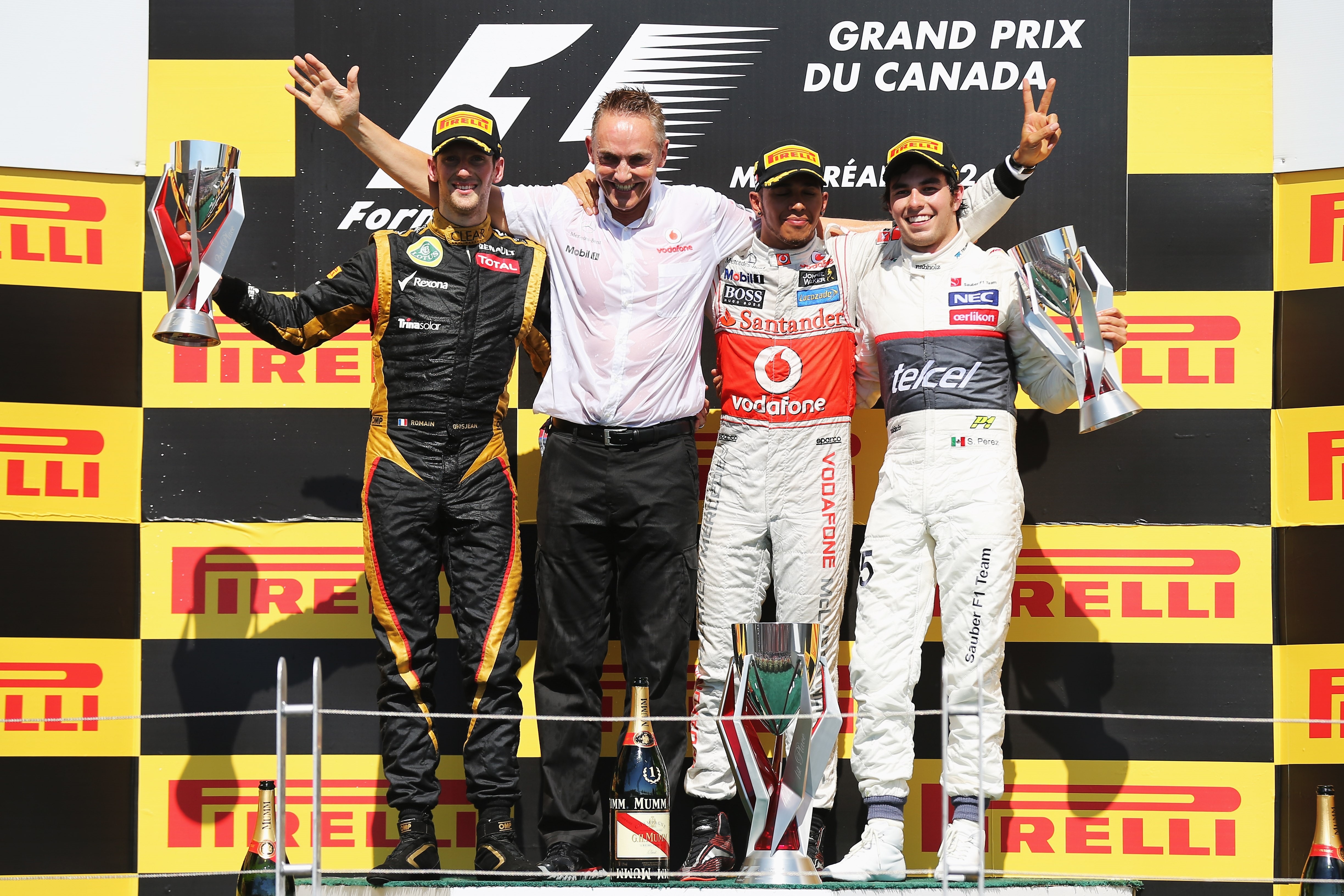 Romain Grosjean (Lotus), Lewis Hamilton, Martin Whitmarsh (McLaren), Sergio Pérez (Sauber) au Grand Prix du Canada 2012