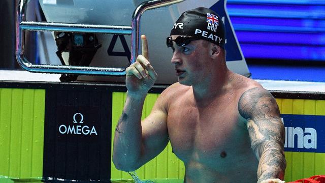Adam Peaty breaks 100 metres breaststroke world record