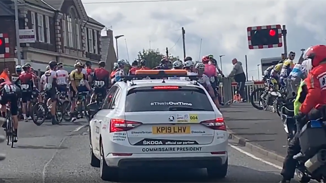 Tour of Britain halted by level crossing Tour of Britain halted by level crossing