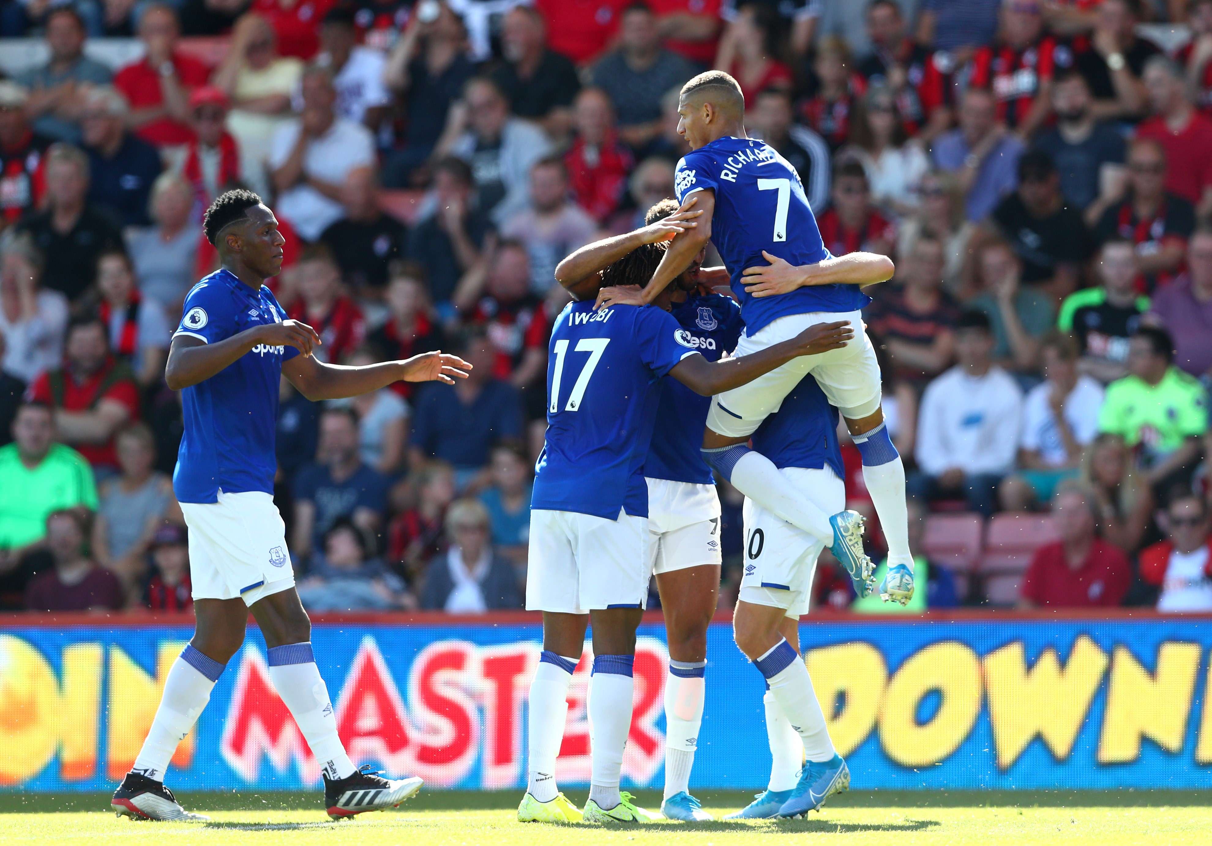 Dominic Calvert-Lewin of Everton (obscured) celebrates after scoring his team's first goal with team mates during the Premier League match between AFC Bournemouth and Everton FC at Vitality Stadium on September 15, 2019 in Bournemouth, United Kingdom.
