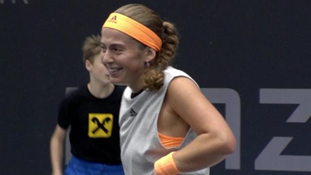 Oops! Ostapenko lets go of her racket during serve Oops! Ostapenko lets go of her racket during serve