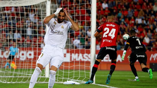 Ten-man Real Madrid slump to defeat to leave Barcelona top