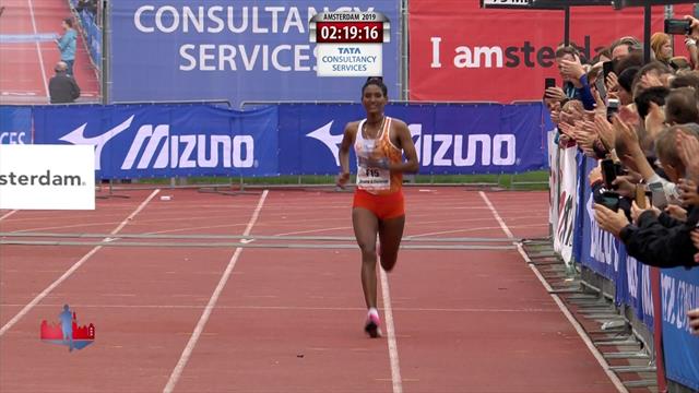 Degitu Azimeraw breaks Amsterdam course record to win in her debut marathon Degitu Azimeraw breaks Amsterdam course record to win in her debut marathon