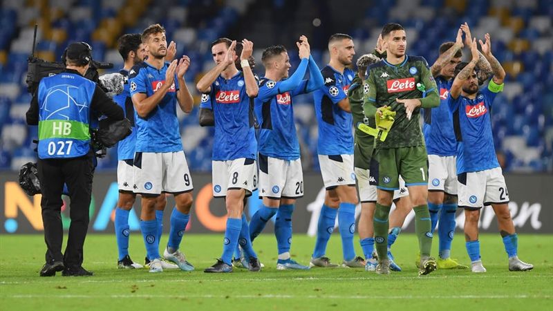 SSC Napoli players applaud their supporters after the UEFA Champions League group E match