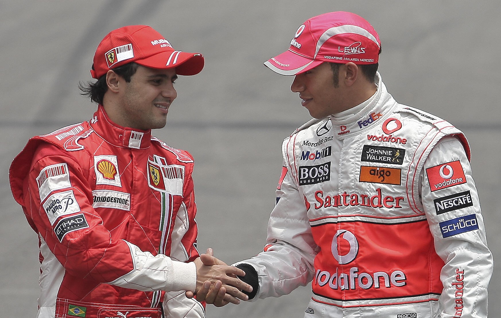 Brazilian Formula One driver Felipe Massa (L) of Ferrari shakes hands with British Lewis Hamilton of McLaren on November 2, 2008 at the Interlagos race track in Sao Paulo, Brazil. Hamilton and Massa will decide the 2008 F1 championship (Getty Images)