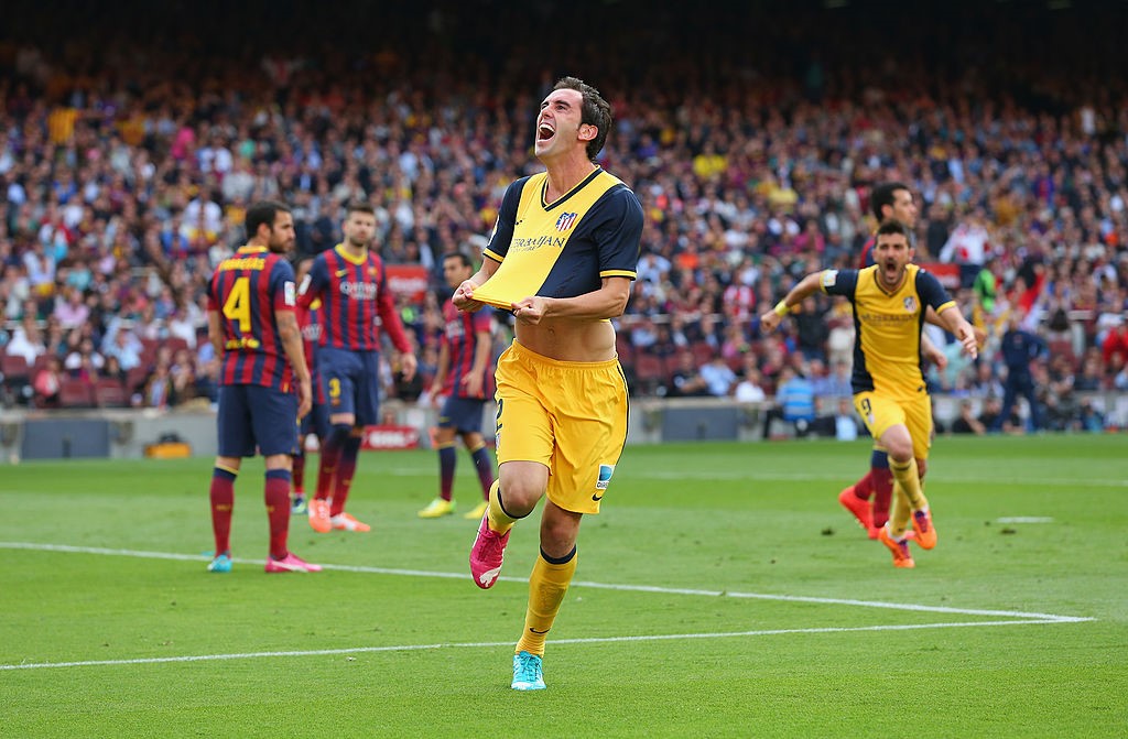 Godín celebrando el gol de la Liga