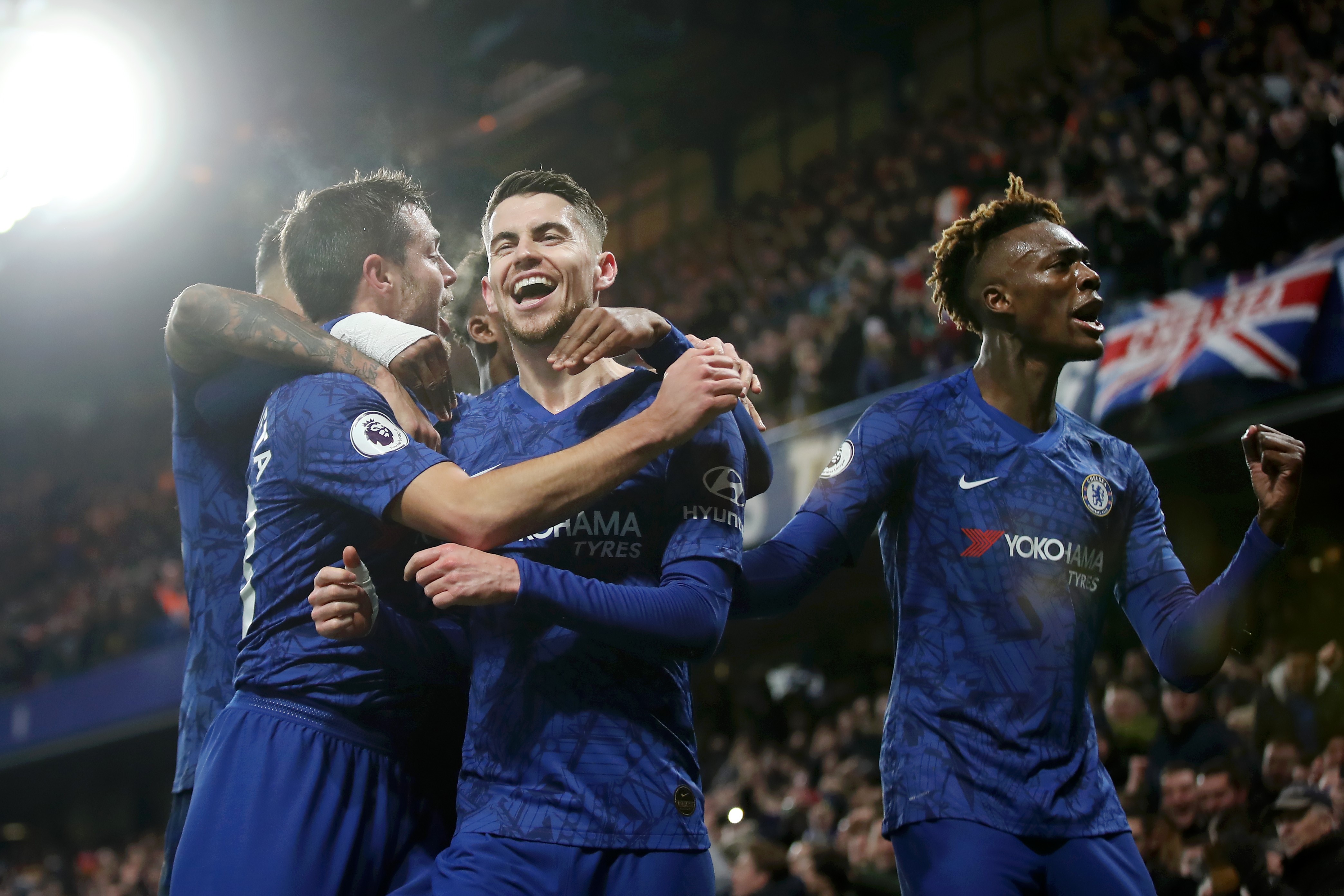 Jorginho of Chelsea celebrates with teammates after scoring his team's first goal during the Premier League match between Chelsea FC and Arsenal FC at Stamford Bridge on January 21, 2020 in London, United Kingdom