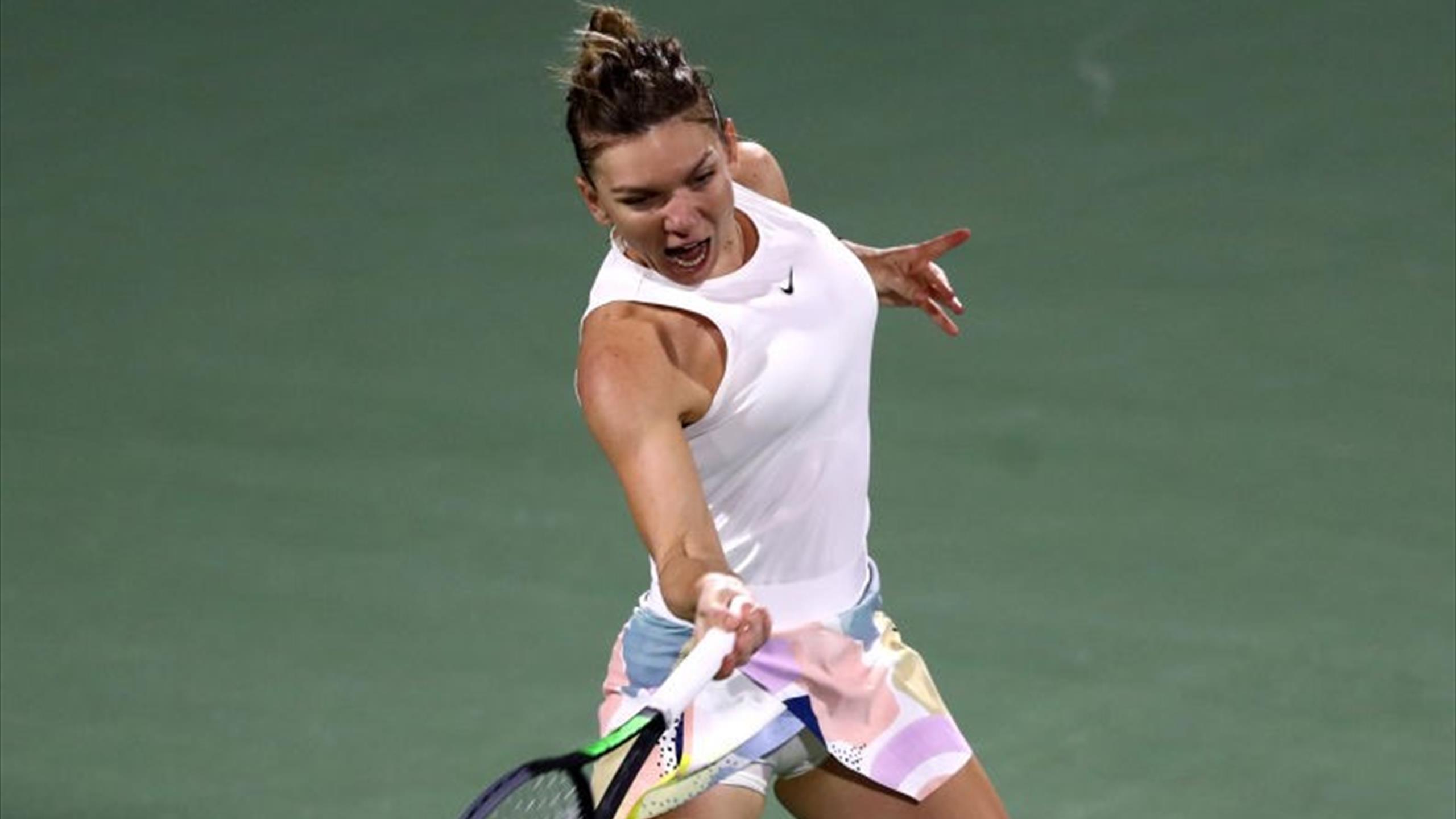 Tennis - Top seed Halep survives Jabeur scare to advance in Dubai