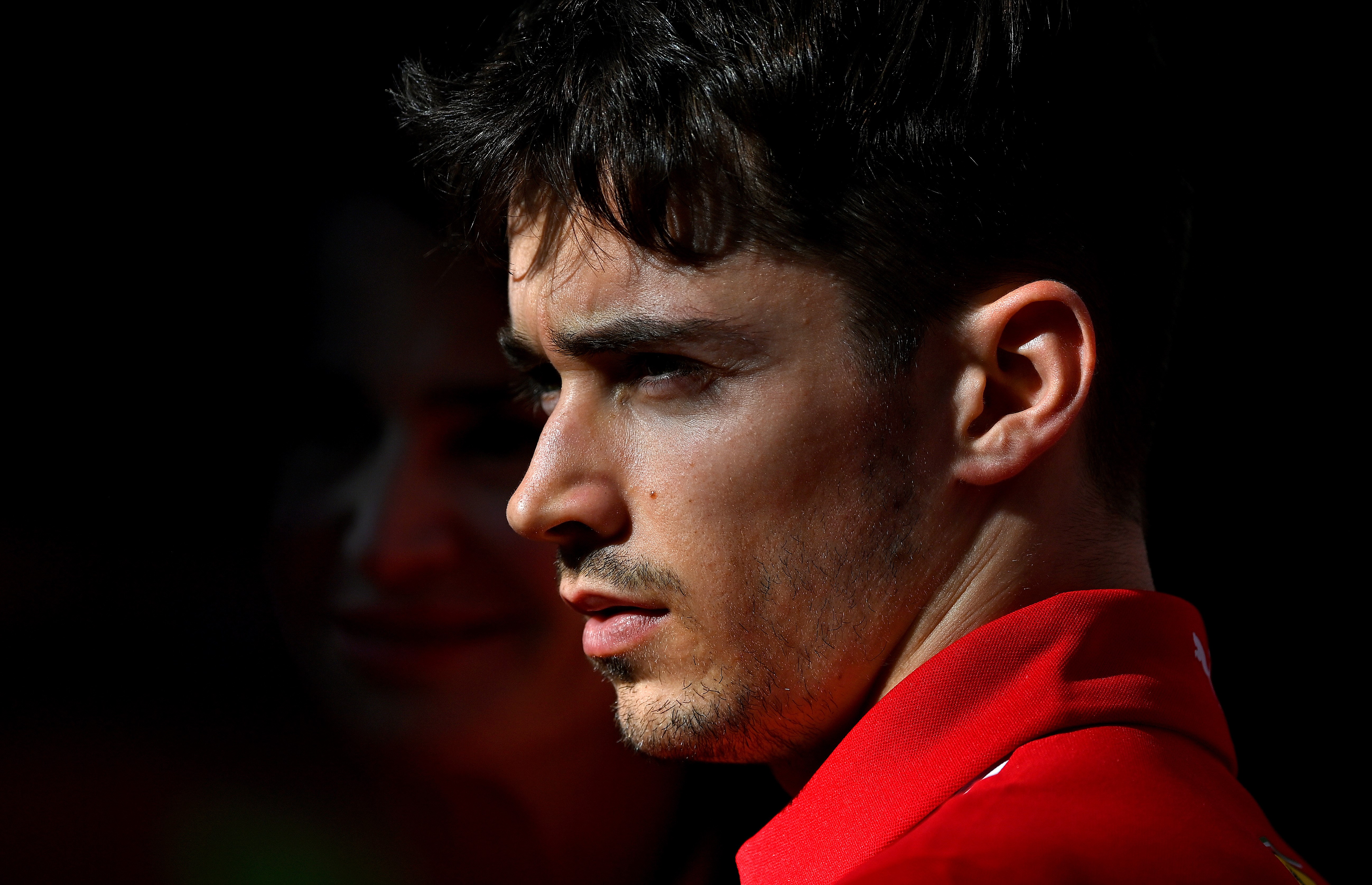 Charles Leclerc of Monaco and Ferrari looks on in the Paddock during previews ahead of the F1 Grand Prix of Australia at Melbourne Grand Prix Circuit on March 12, 2020 in Melbourne, Australia.