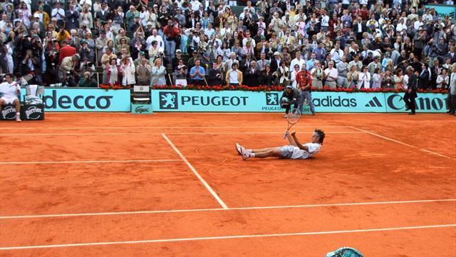 Kuerten draws heart on court at Roland-Garros in 2001 Kuerten draws heart on court at Roland-Garros in 2001