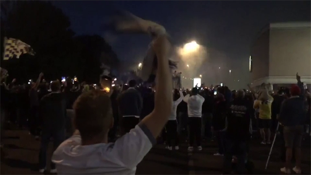 Leeds fans ignore social distancing to celebrate title win with players Leeds fans ignore social distancing to celebrate title win with players