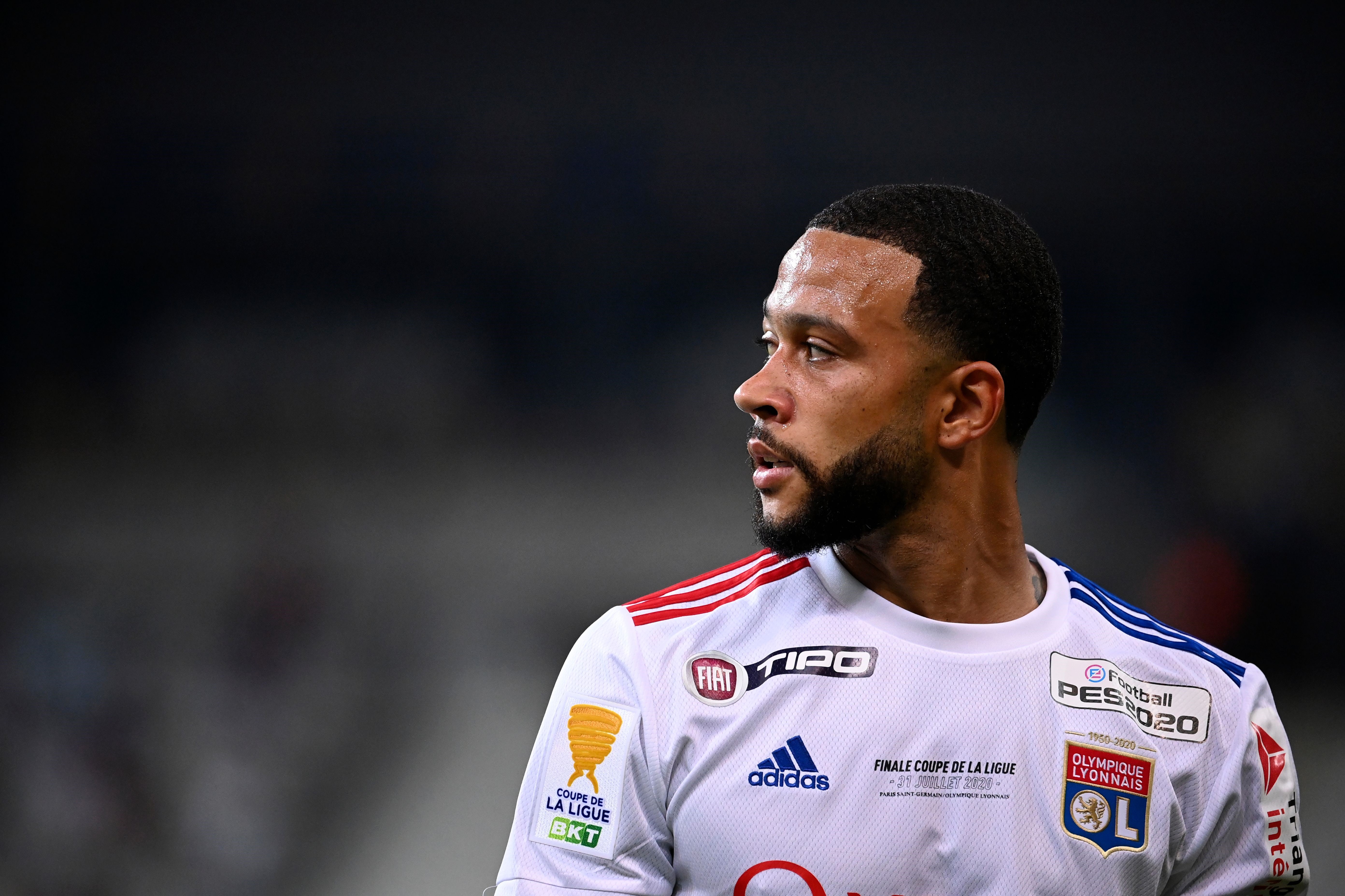 Lyon's Dutch forward Memphis Depay looks on during the French League Cup final football match between Paris Saint-Germain vs Olympique Lyonnais at the Stade de France in Saint-Denis on July 31, 2020. (Photo by FRANCK FIFE / AFP) (Photo by FRANCK FIFE/AFP