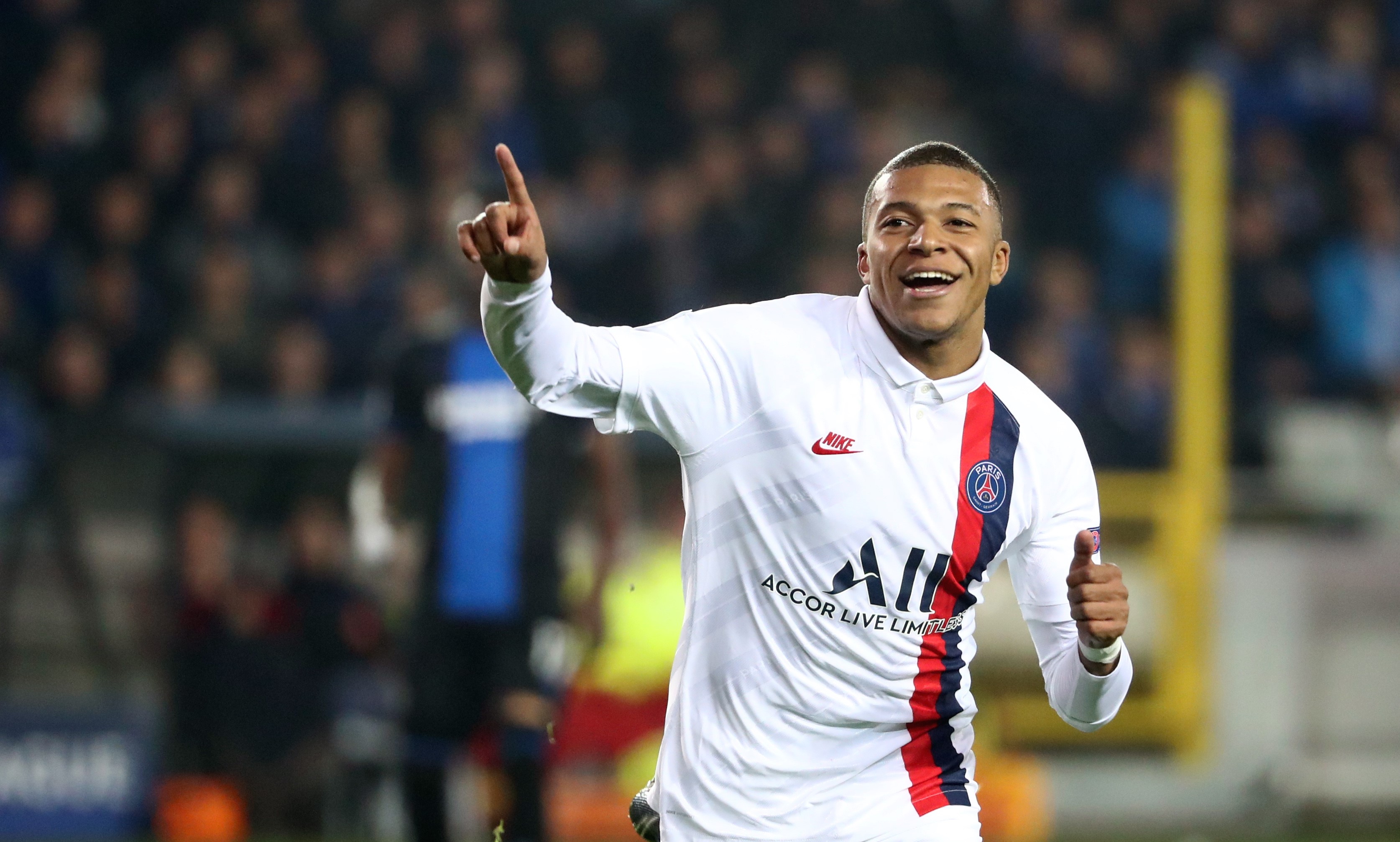 Kylian Mbappe of PSG celebrates after scoring a goal during the UEFA Champions League group A match between Club Brugge KV and Paris Saint-Germain at Jan Breydel Stadium on October 22, 2019 in Brugge, Belgium.