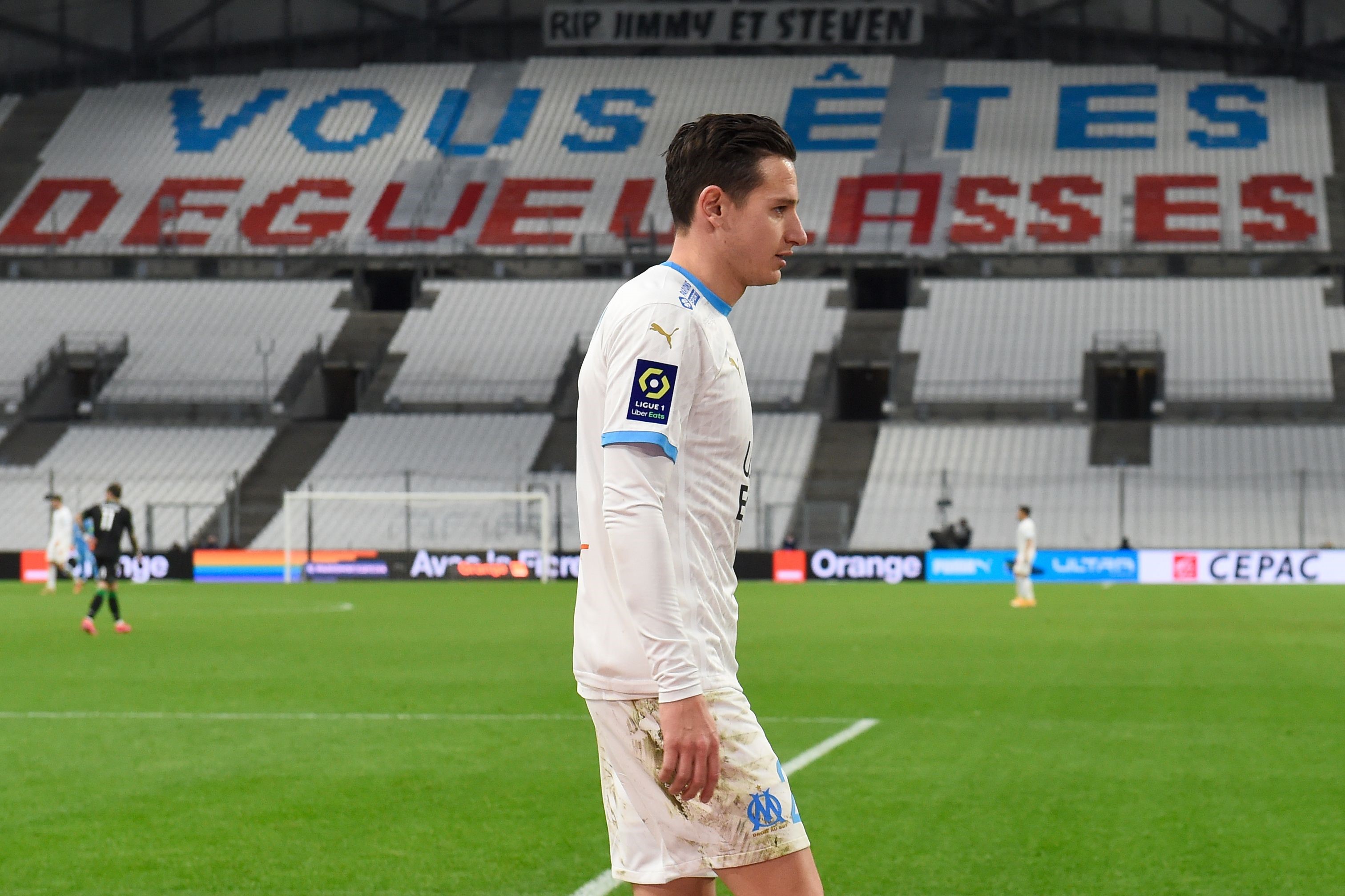 Florian Thauvin leaves the pitch after being substituted during the French L1 football match between Olympique de Marseille (OM) and Lens (RCL) at the Velodrome