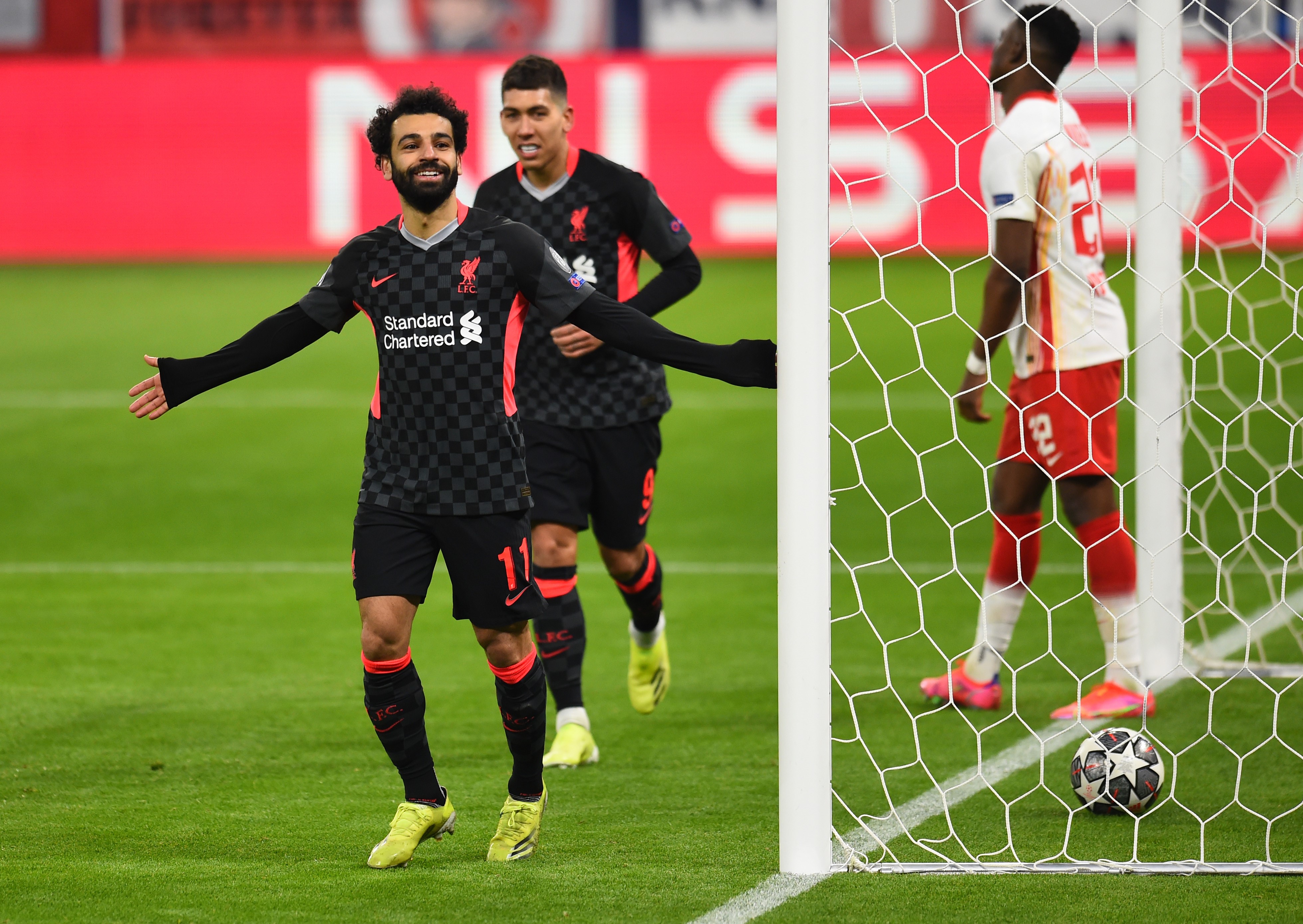 )Mohamed Salah of Liverpool celebrates after scoring the first goal during the UEFA Champions League Round of 16 match between RB Leipzig and Liverpool FC at Puskas Arena on February 16, 2021 in Budapest, Hungary