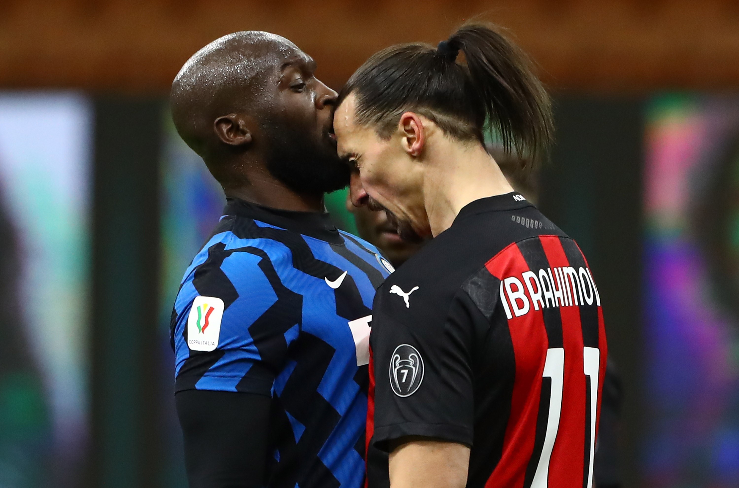 Romelu Lukaku of FC Internazionale clashes with Zlatan Ibrahimovic of AC Milan