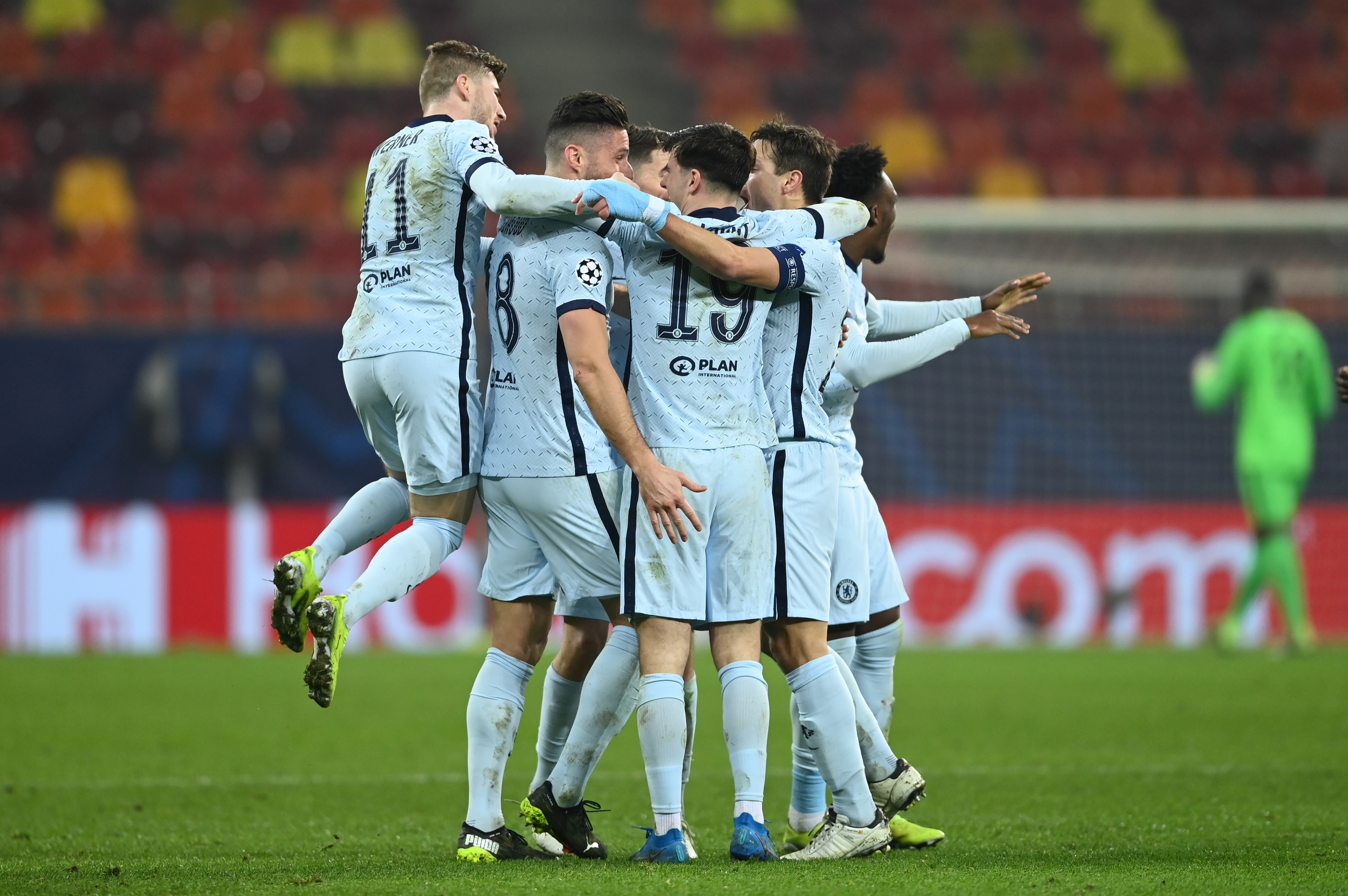 Olivier Giroud of Chelsea celebrates with team mates after scoring their side's first goal during the UEFA Champions League Round of 16 match between Atletico Madrid and Chelsea FC at National Arena on February 23, 2021 in Bucharest, Romania.