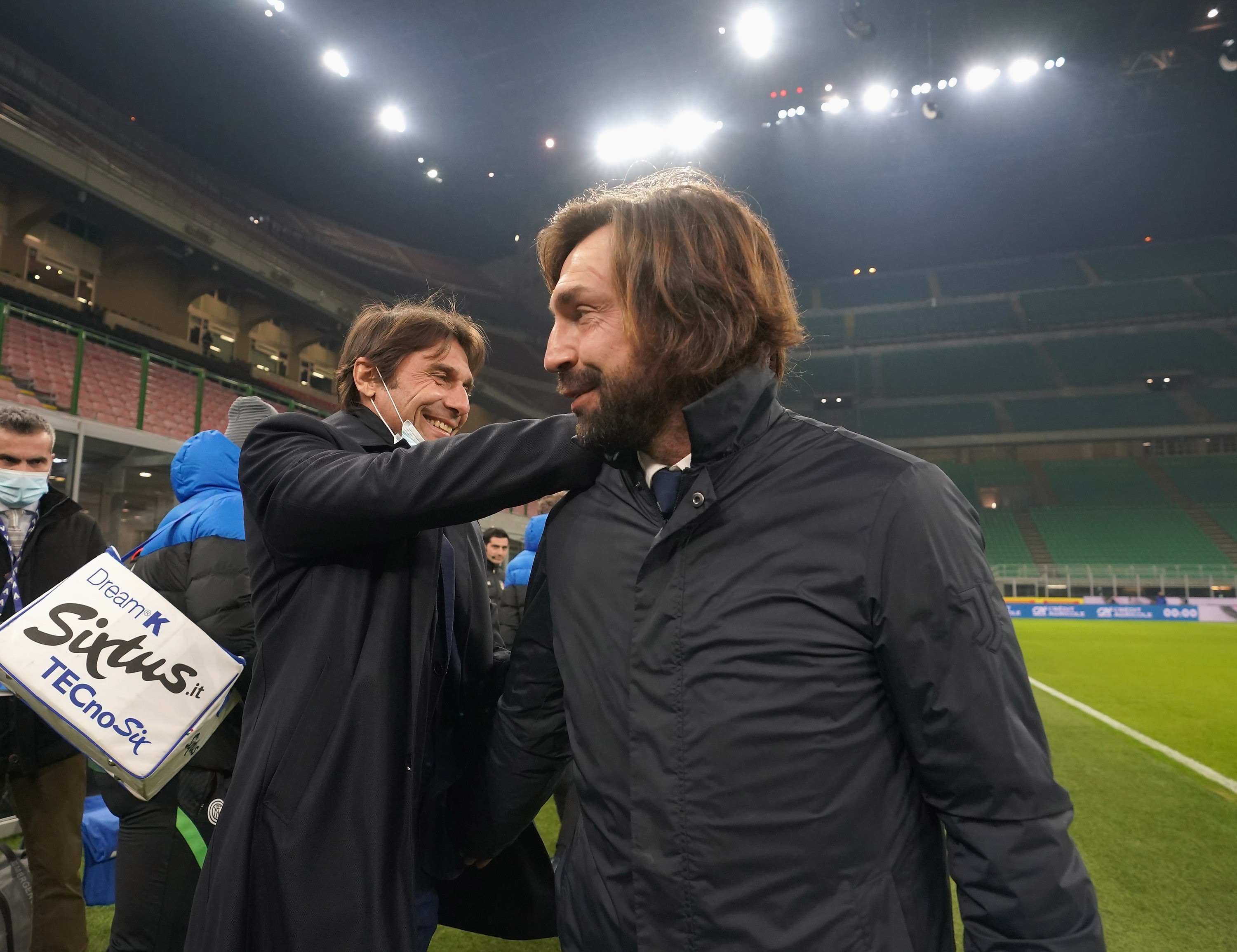 Antonio Conte and Andrea Pirlo chat during the Serie A match between FC Internazionale and Juventus at Stadio Giuseppe Meazza on January 17, 2021