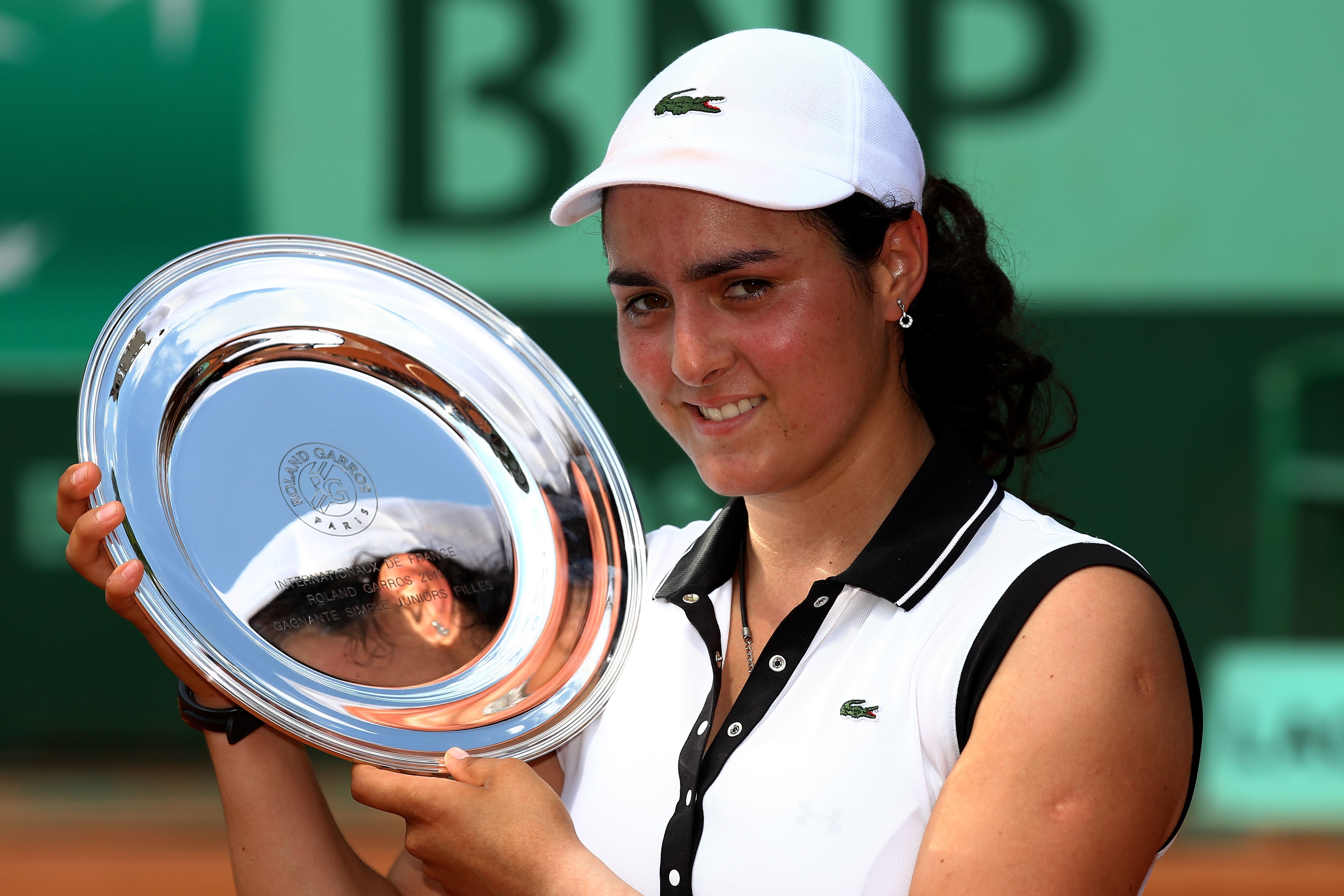 Ons Jabeur lifts the Girls’ Singles trophy at Roland-Garros in 2011 to become North Africa’s first ever female to win a junior Grand Slam event