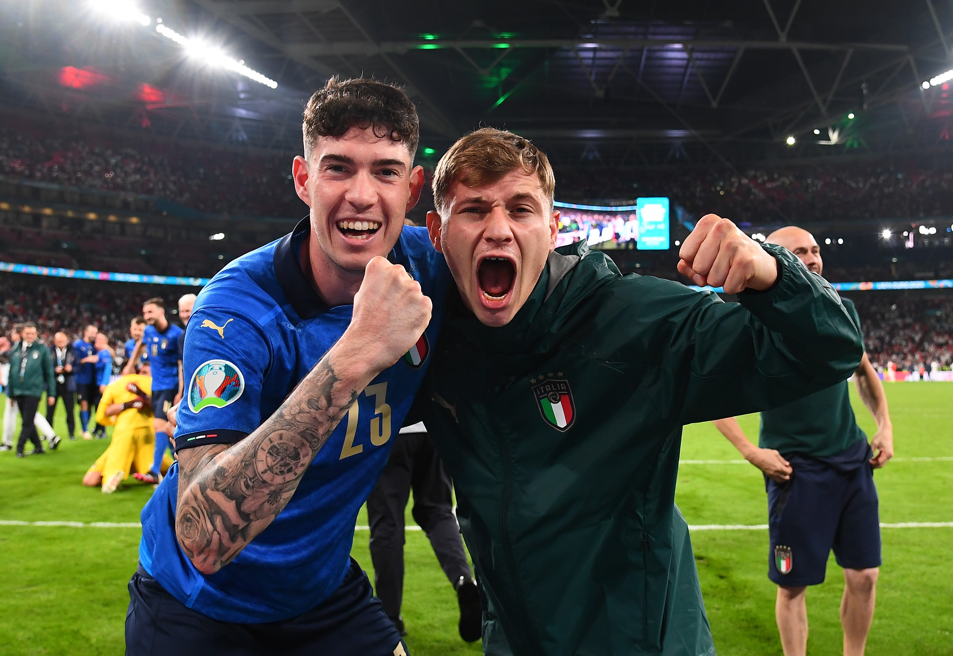 Alessandro Bastoni of Italy and Nicolo Barella of Italy celebrate following their team's victory in the UEFA Euro 2020 Championship Final between Italy and England