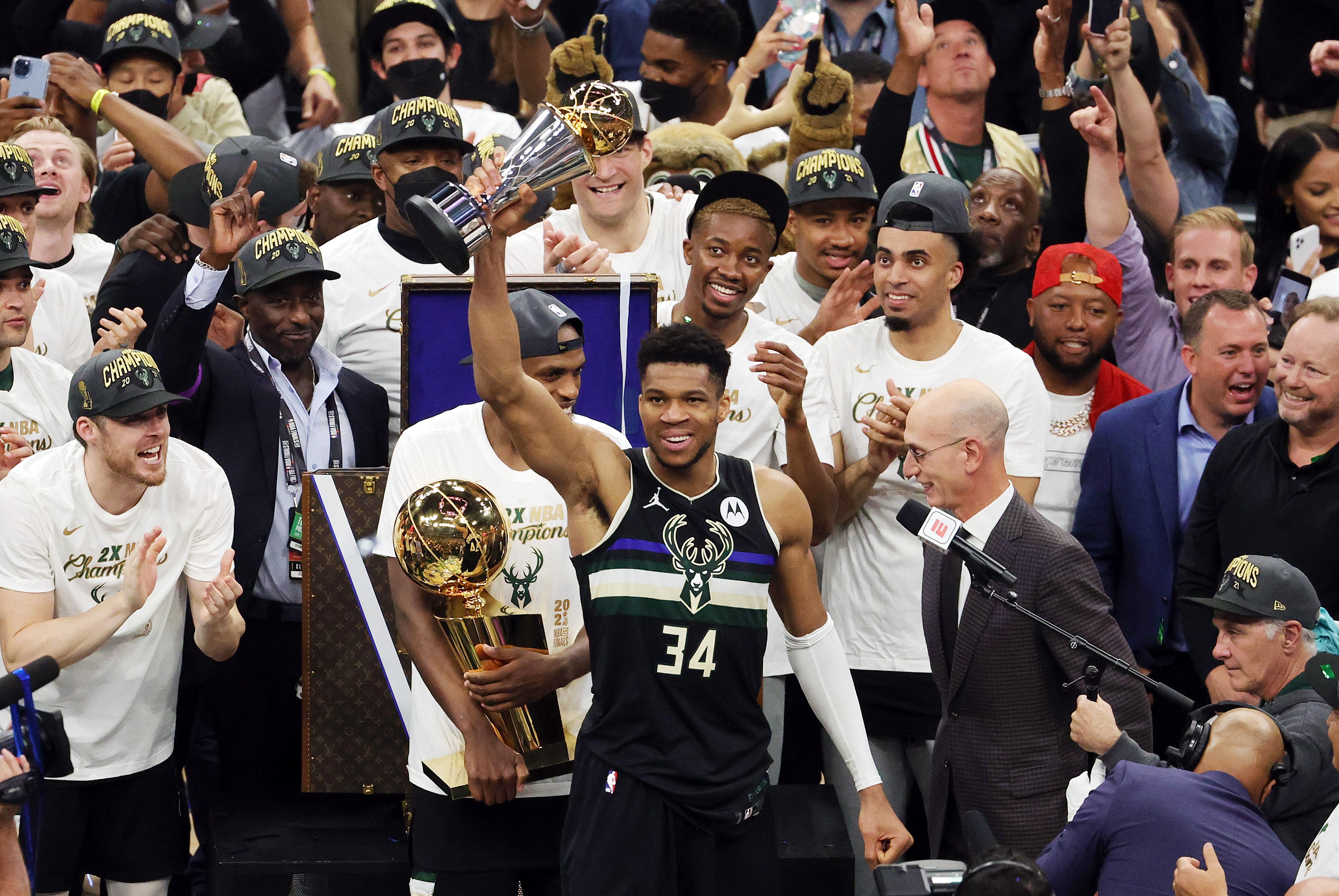 Giannis Antetokounmpo #34 of the Milwaukee Bucks celebrates winning the Bill Russell NBA Finals MVP Award after defeating the Phoenix Suns in Game Six to win the 2021 NBA Finals at Fiserv Forum on July 20, 2021 in Milwaukee