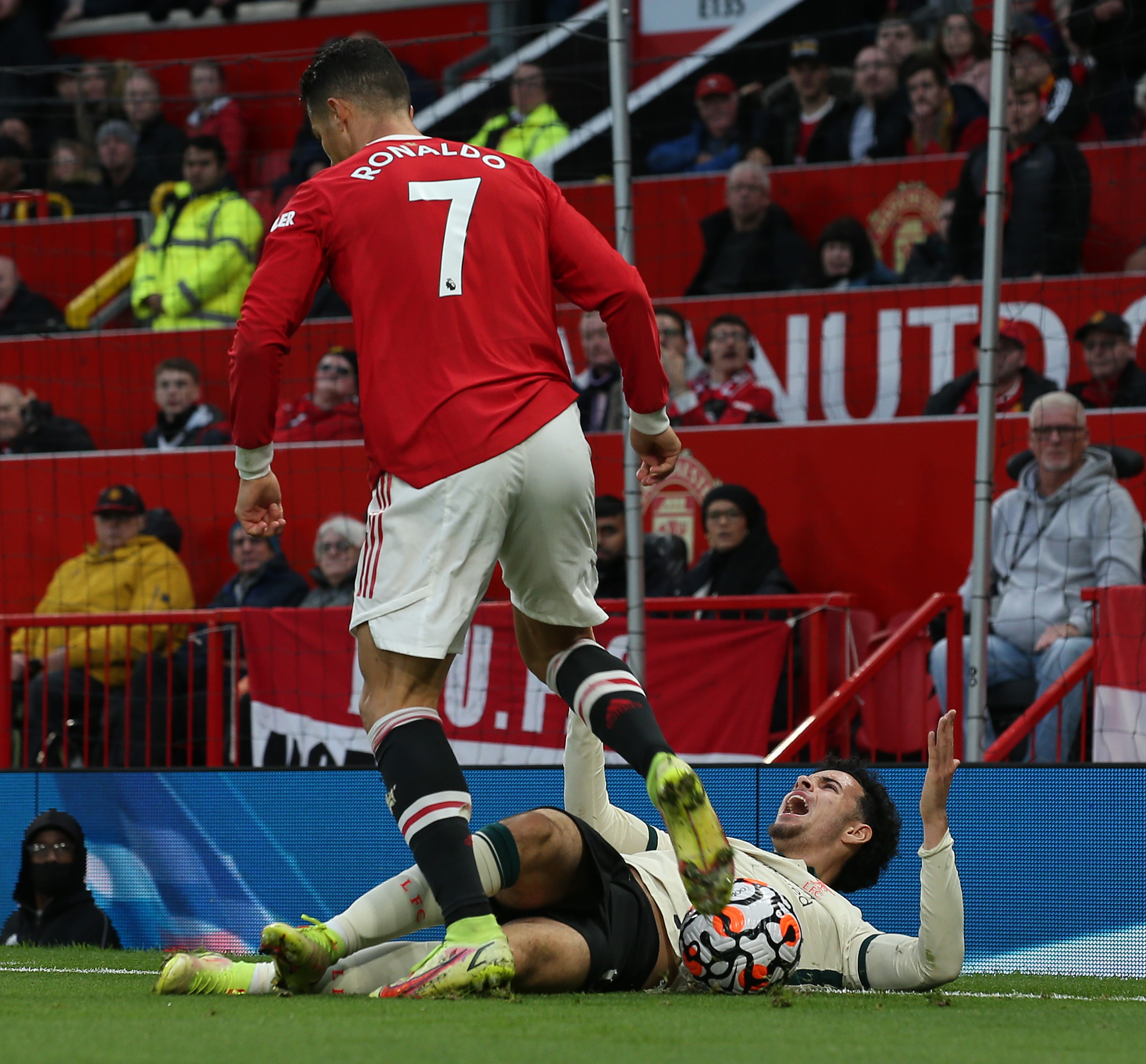 Cristiano Ronaldo of Manchester United clashes with Curtis Jones of Liverpool during the Premier League match between Manchester United and Liverpool at Old Trafford on October 24, 2021 in Manchester, England