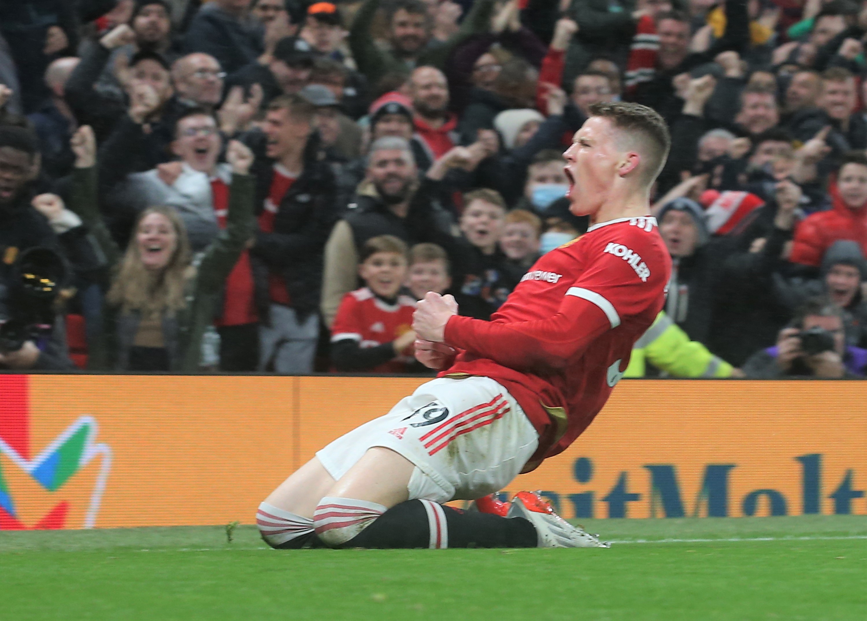 Scott McTominay of Manchester United celebrates scoring their first goal during the Premier League match between Manchester United and Burnley at Old Trafford on December 30, 2021