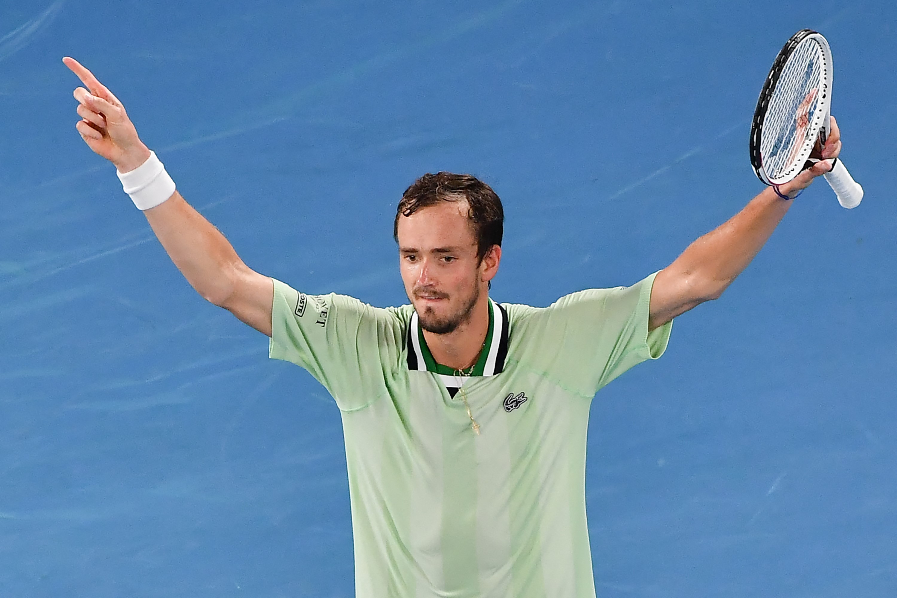 Russia's Daniil Medvedev reacts after winning the second set against Spain's Rafael Nadal during their men's singles final match on day fourteen of the Australian Open tennis tournament in Melbourne on January 30, 2022.