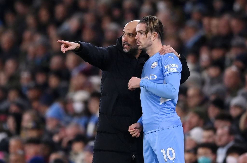 Pep Guardiola e Jack Grealish durante Manchester City-Brentford - Premier League 2021-22