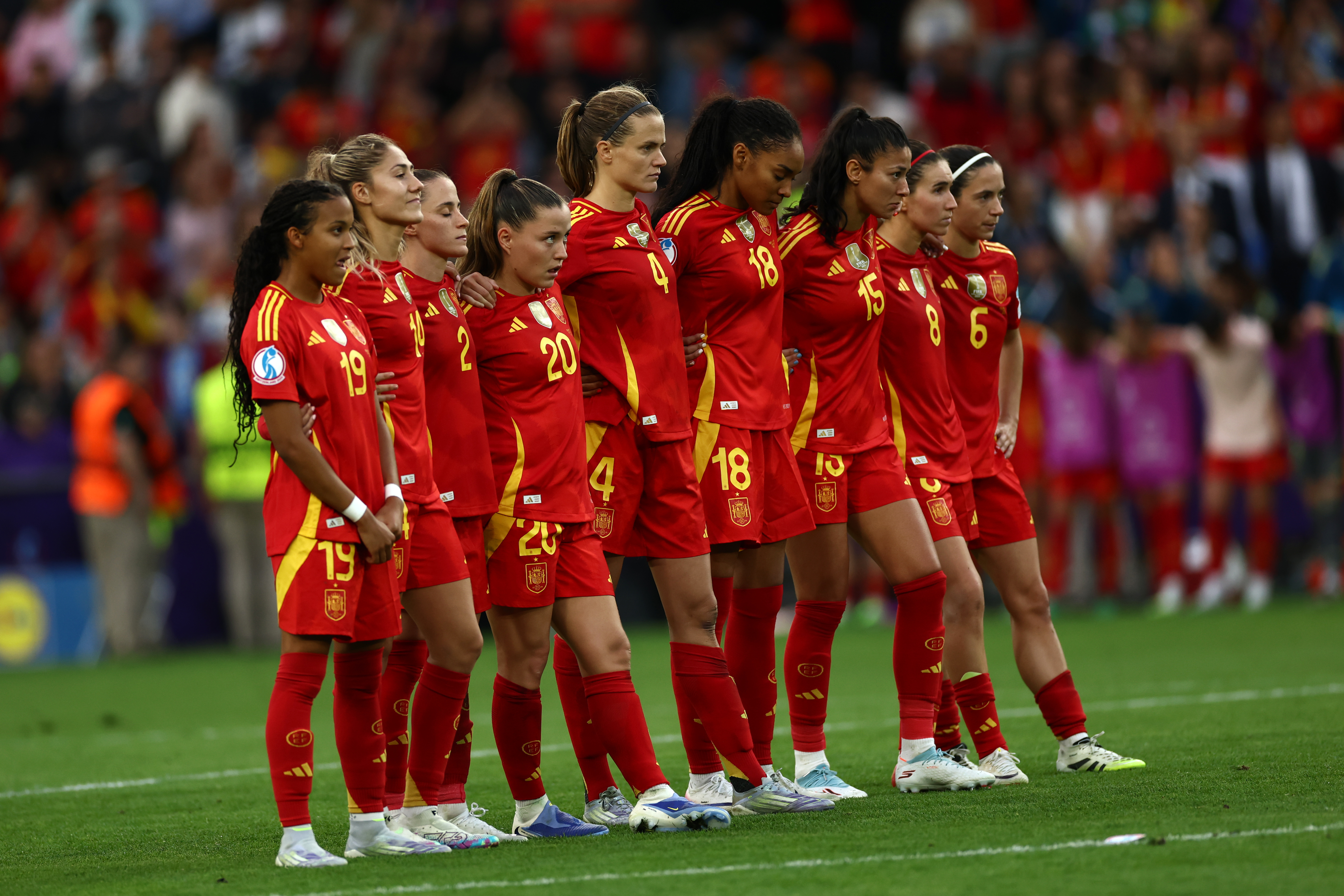 Spain players watch on during the Euro 2025 penalty shoot-out against England.