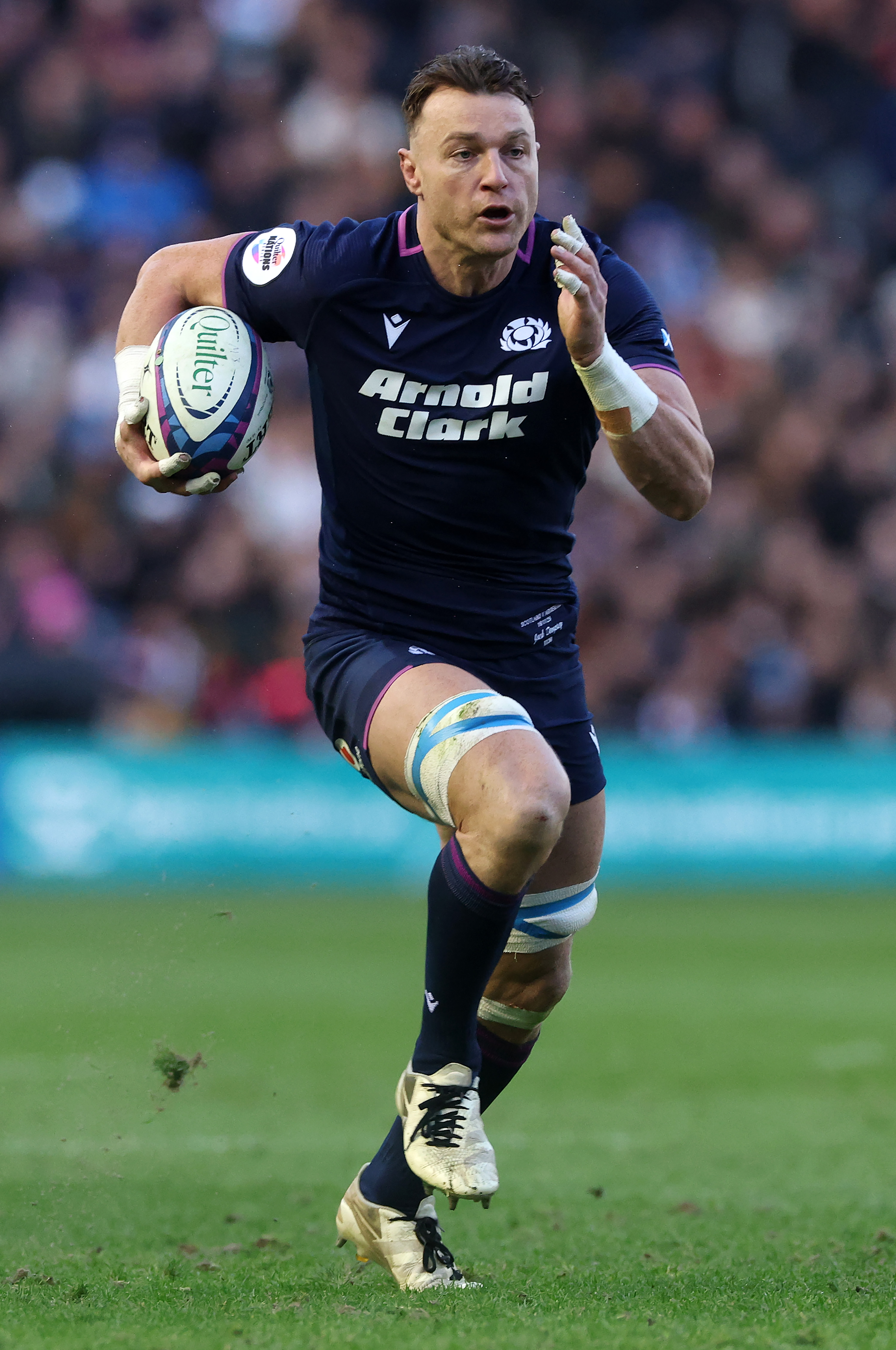 Jack Dempsey of Scotland runs with the ball during the Quilter Nations Series 2025 rugby international match between Scotland and Argentina at Scottish Gas Murrayfield on November 16, 2025 in Edinburgh, Scotland.