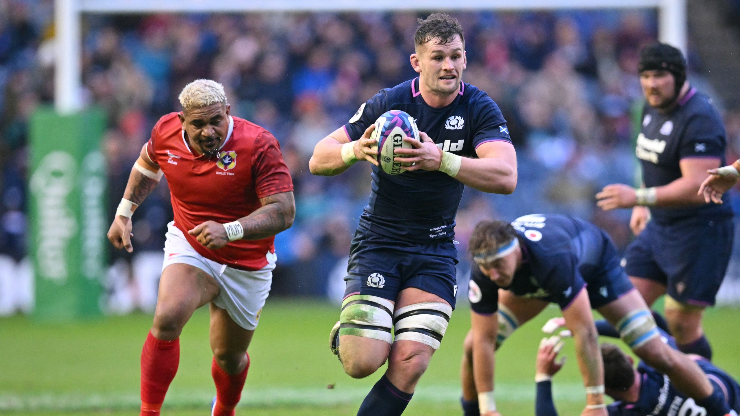 Rampant Scotland score eight tries to thrash Tonga