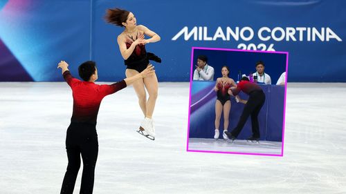 Why was Japan figure skater spraying his partner?