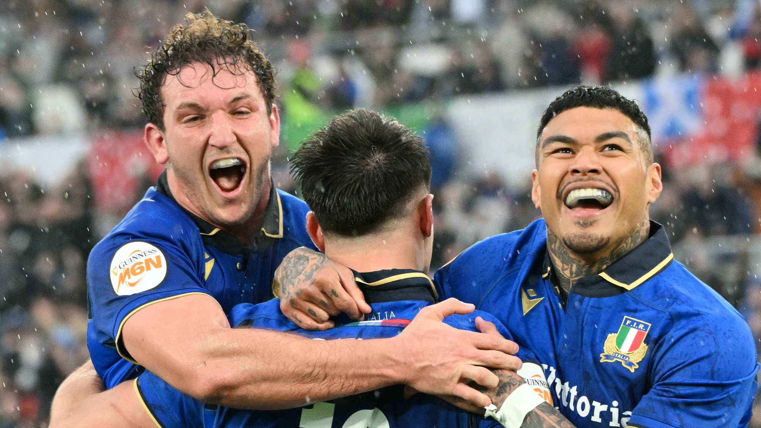 Italy edge out Scotland in rain-lashed Rome