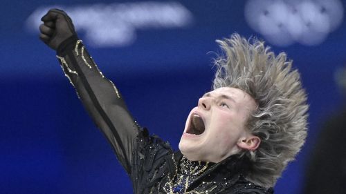 Malinin delivers gold-winning routine as Djokovic watches on